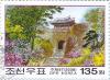 Colnect-3176-068-Pavilions-and-flowering-shrubs-on-Moran-Hill-Pyongyang.jpg