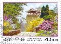 Colnect-3176-066-Pavilions-and-flowering-shrubs-on-Moran-Hill-Pyongyang.jpg