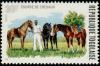Colnect-3727-040-Groom-with-Horses.jpg