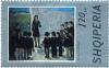 Colnect-1435-999-Teacher-with-Pupils-at-the-War-Memorial-by-Nini-Kleo.jpg