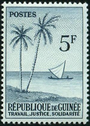 Colnect-537-242-Palm-trees-and-dhow-sailing-ship.jpg
