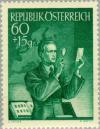 Colnect-136-326-Collector-examining-a-stamp.jpg