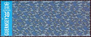 Colnect-5552-010-Silhouette-of-Doves-in-Flight.jpg