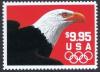 Colnect-199-795-Bald-Eagle-Haliaeetus-leucocephalus-and-Olympic-Rings.jpg
