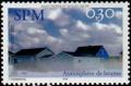Colnect-878-809-Houses-in-the-mist.jpg
