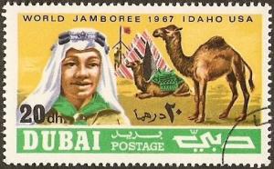 Colnect-2191-936-Arabian-boy-scout-in-front-of-scout-camp-camel.jpg