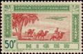 Colnect-853-016-Aircraft-and-caravan-date-palm.jpg