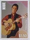 Colnect-4748-007-Elvis-Presley-in-brown-red-shirt-playing-guitar.jpg