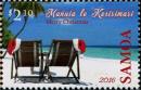 Colnect-4774-216-Merry-Christmas---Beach-chairs-with-Christmas-caps.jpg