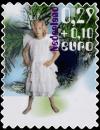 Colnect-667-611-Child-dressed-up-as-angel.jpg