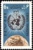 Colnect-1883-758-UN-Emblem-over-globe.jpg