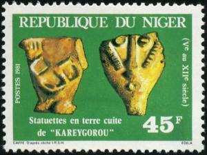 Colnect-5112-796-Terracotta-statuette-of--Kareygorou--5-to-12th-centuries.jpg