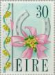 Colnect-128-991-Flowers-Ribbon-and-Horseshoe.jpg