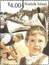 Colnect-2777-133-Young-Boy-shipwright-and-whaleboat.jpg