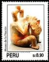 Colnect-1419-896-Mochican-Art---Figure-holding-severed-head.jpg