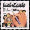 Colnect-793-377-Writing-hand-and-people--quot-Mobral-quot--literacy-campaign.jpg